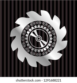 CD or DVD disc icon inside silver emblem