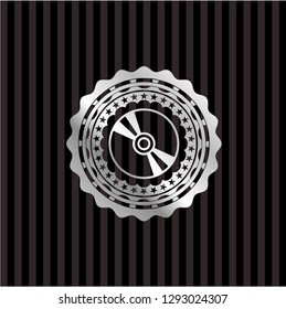 CD or DVD disc icon inside silvery shiny emblem