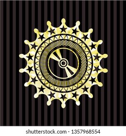 CD or DVD disc icon inside gold badge or emblem