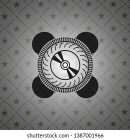 CD or DVD disc icon inside realistic dark emblem
