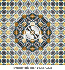 CD or DVD disc icon inside arabic badge. Arabesque decoration.