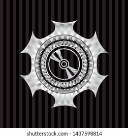 CD or DVD disc icon inside silvery badge or emblem