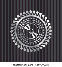 CD or DVD disc icon inside silver emblem