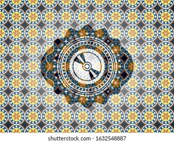CD or DVD disc icon inside arabic style emblem. Arabesque decoration.