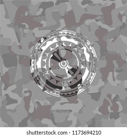 CD or DVD disc icon on grey camouflaged texture
