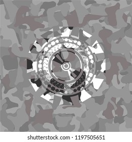 CD or DVD disc icon on grey camo texture