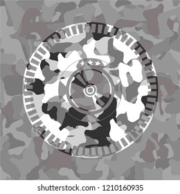 CD or DVD disc icon on grey camouflaged texture