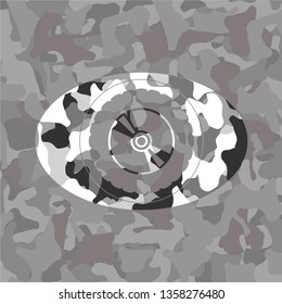 CD or DVD disc icon on grey camo pattern