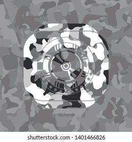 CD or DVD disc icon on grey camouflage pattern