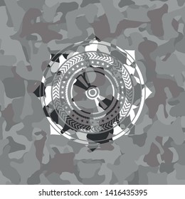 CD or DVD disc icon on grey camo texture
