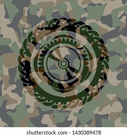 CD or DVD disc icon on camo pattern