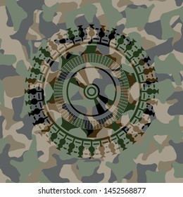 CD or DVD disc icon on camo pattern