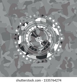 CD or DVD disc icon on grey camouflaged texture