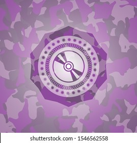 CD or DVD disc icon on pink and purple camo texture