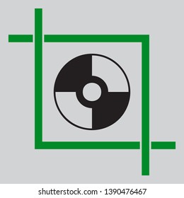 CD or DVD sign. Black icon inside green crop tool at light gray background