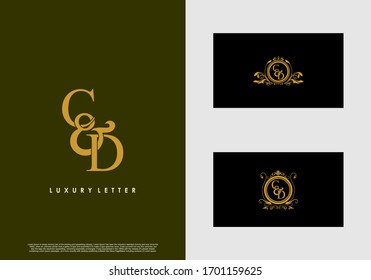 CD logo initial vector mark. Gold color elegant classical symmetric curves decor.