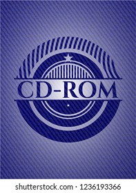 CD-ROM badge with denim texture