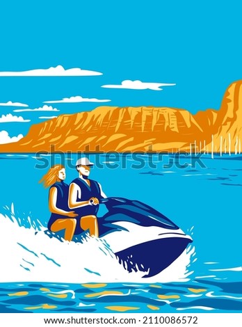 Cedar Bluff State Park with Couple Riding watercraft in Cedar Bluff Reservoir in Kansas 
