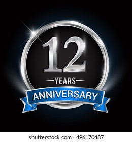 Celebrating 12 years anniversary logo with silver ring and blue ribbon.