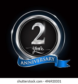 Celebrating 2 years anniversary logo. with silver ring and blue ribbon.