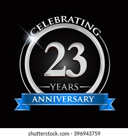 Celebrating 23 years anniversary logo. with silver ring and blue ribbon.