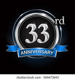Celebrating 33rd anniversary logo. with silver ring and blue ribbon.