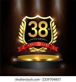 Celebrating 38 years anniversary logo with golden shield and ribbon, laurel wreath, cylinder podium vector design.