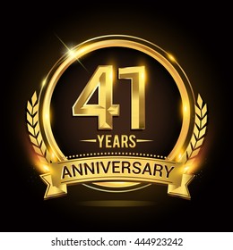 Celebrating 41 years anniversary logo with golden ring and ribbon, laurel wreath vector design.