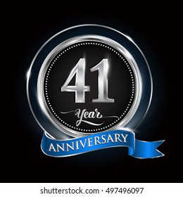 Celebrating 41 years anniversary logo. with silver ring and blue ribbon.