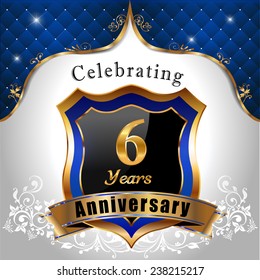 celebrating 6 years anniversary, Golden sheild with blue royal emblem background - vector eps10