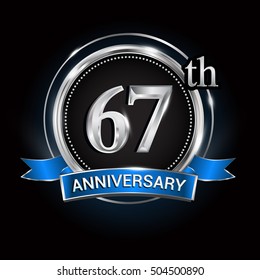 Celebrating 67th anniversary logo. with silver ring and blue ribbon.