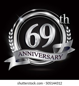 Celebrating 69th anniversary logo, with silver ring and ribbon.