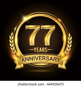 Celebrating 77 years anniversary logo with golden ring and ribbon, laurel wreath vector design.