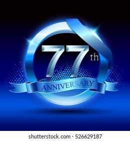 Celebrating 77 years anniversary logo. with silver ring and blue ribbon,