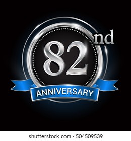 Celebrating 82nd anniversary logo. with silver ring and blue ribbon.