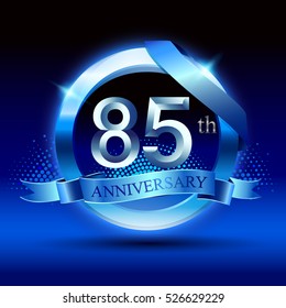 Celebrating 85 years anniversary logo. with silver ring and blue ribbon,