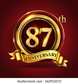 Celebrating 87th golden anniversary, eighty seven years birthday logo celebration with gold ring and golden ribbon.