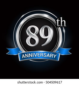 Celebrating 89th anniversary logo. with silver ring and blue ribbon.