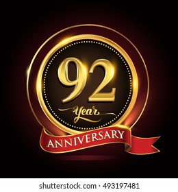 Celebrating 92 years anniversary template logo with golden ring and red ribbon.