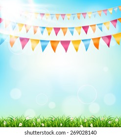 Celebration background with buntings grass and sunlight on sky background