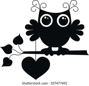 celebration black owl with a big heart