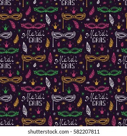 Celebration Carnival Seamless pattern. Mardi Gras Party. Hand drawn Mardi Gras lettering with Venetian masquerade mask, feathers and stars. Holiday Vector background