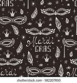 Celebration Carnival Seamless pattern. Mardi Gras Party. Hand drawn Mardi Gras lettering with Venetian masquerade mask, feathers and stars. Holiday Vector background