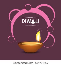 Celebration of Diwali with illuminated oil lit lamp and stylish text of Happy Diwali.