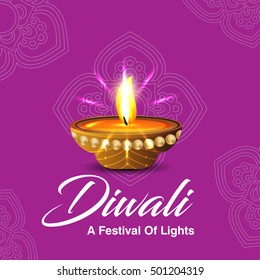 Celebration of Diwali with illuminated oil lit lamp and stylish text of Happy Diwali.