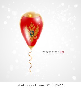 Celebration and gifts. Ribbon in the colors are twisted under the balloon. Independence Day. Balloons on the feast the national Flag of Montenegro