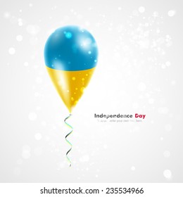 Celebration and gifts. Ribbon in the colors are twisted under the balloon. Independence Day. Balloons on the feast the national Ukrainian flag