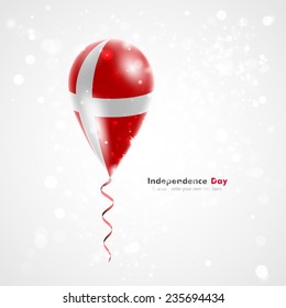 Celebration and gifts. Ribbon in the colors are twisted under the balloon. Independence Day. Balloons on the feast the national  Flag of Denmark