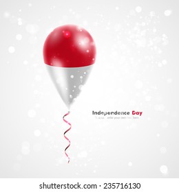 Celebration and gifts. Ribbon in the colors are twisted under the balloon. Independence Day. Balloons on the feast the national Flag of Indonesia