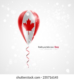 Celebration and gifts. Ribbon in the colors are twisted under the balloon. Independence Day. Balloons on the feast the national  Flag of Canada